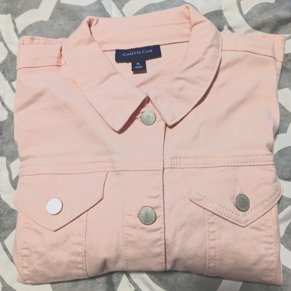 Pink colored jean jacket size petite large.